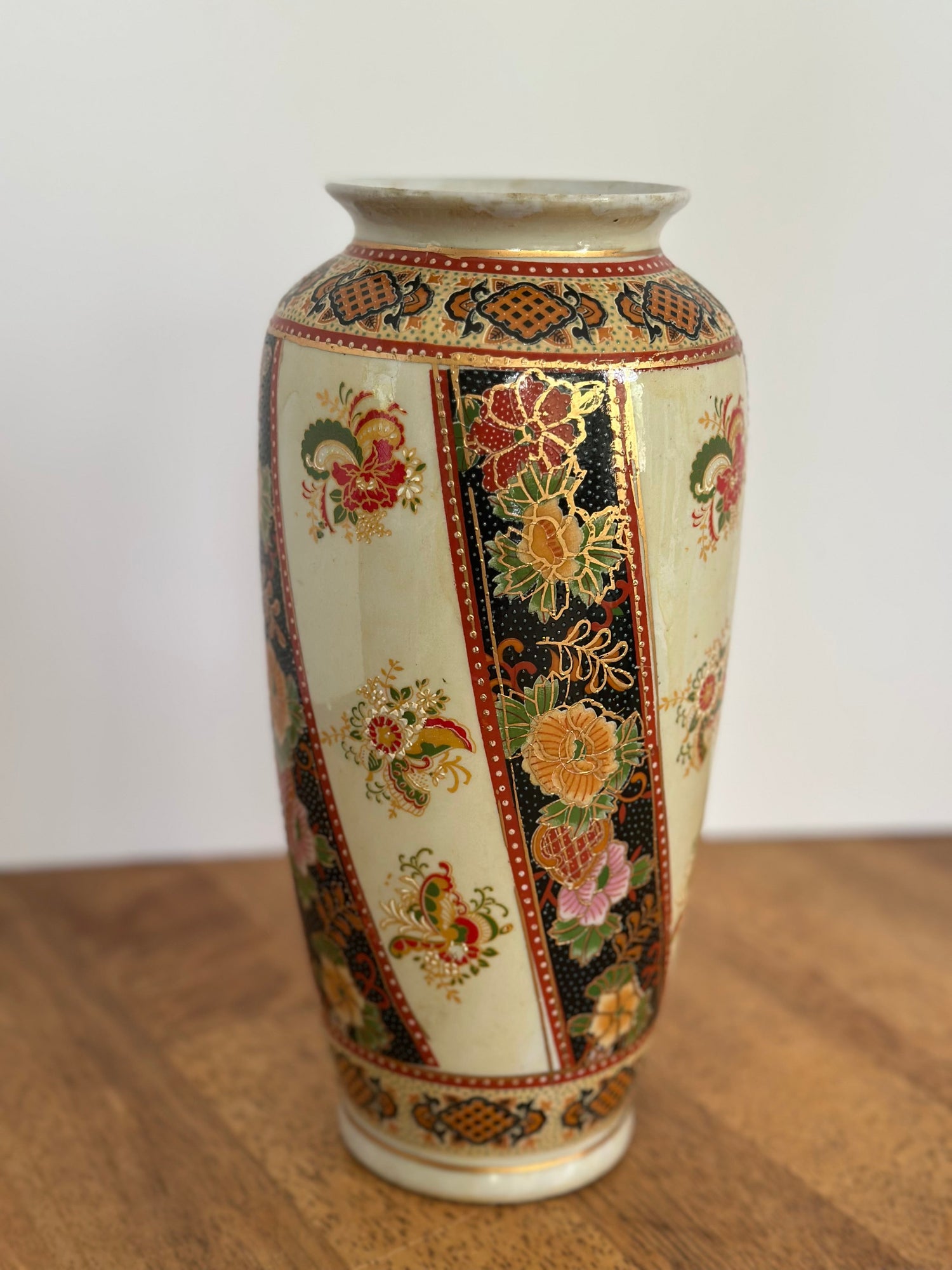 colorful vase with gold trim