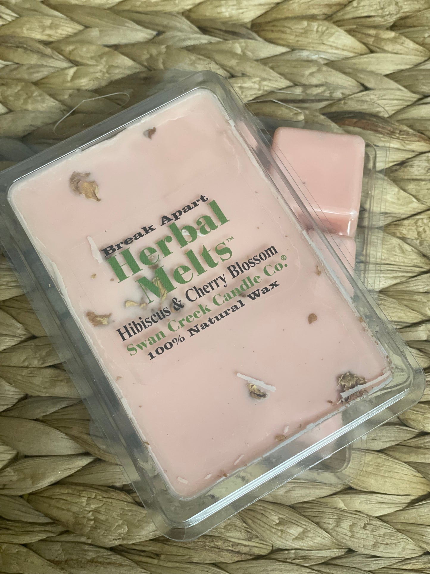 Swan Creek Herbal Melts Hibiscus & Cherry Blossom scented wax cubes. Pink break-apart candle melts with floral accents for a sweet aroma.