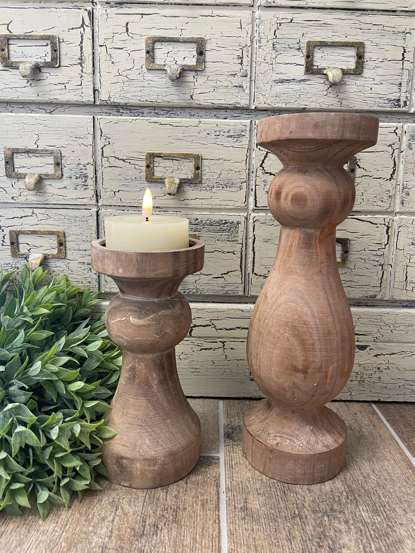 Set of wooden Everly Candle Holders in different sizes, showcasing elegant craftsmanship. Ideal for home decor and ambient lighting.