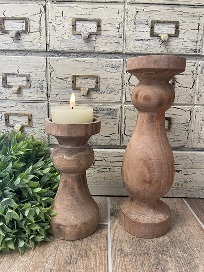 Set of wooden Everly Candle Holders in different sizes, showcasing elegant craftsmanship. Ideal for home decor and ambient lighting.