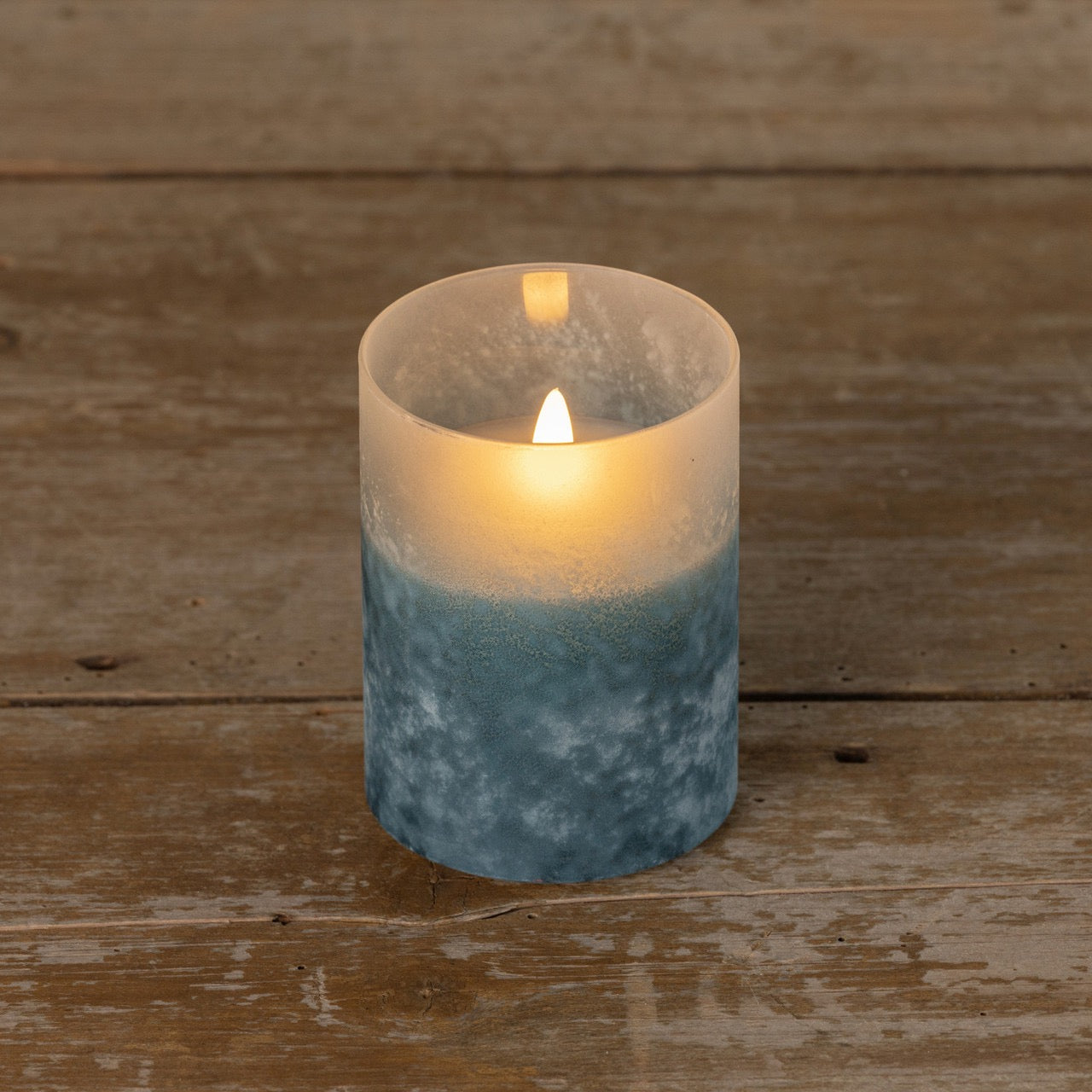 3D flame candle with blue frosted glass, 4-inch size, emitting a warm, realistic glow. Elegant decor piece for a tranquil ambiance.