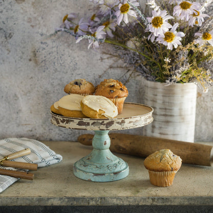 10-inch aged riser with a distressed cream top and blue base, perfect for displaying baked goods, candles, or decorative accents in rustic decor.