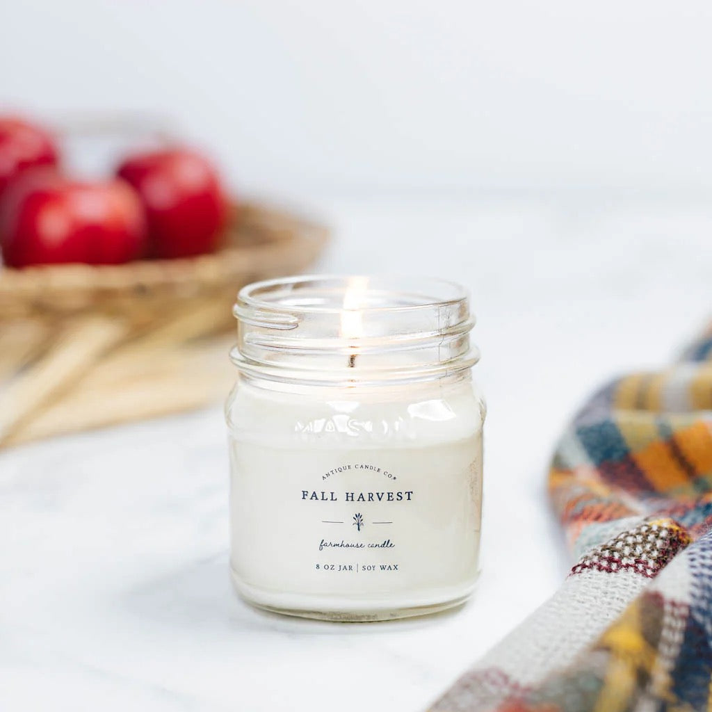 Antique Candle Co Fall Harvest soy wax candle in an 8oz glass jar. A cozy autumn fragrance with a 40-hour burn time.