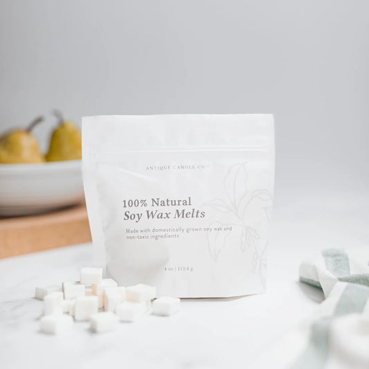 Antique Candle Co 100% soy wax melts 4 oz in elegant packaging. These natural wax tarts offer a sustainable way to fill your home with soothing fragrances.